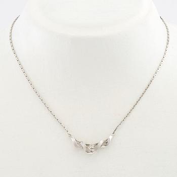 Necklace 18K white gold with a round single-cut diamond.