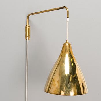 Lisa Johansson-Pape, A mid 20th century wall light for Stockmann Orno, Finland.