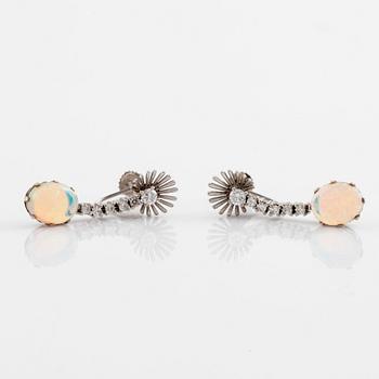 Opal and round brilliant cut diamond earrings.