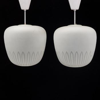 A pair of 1940's Swedish medern ceiling lamps.