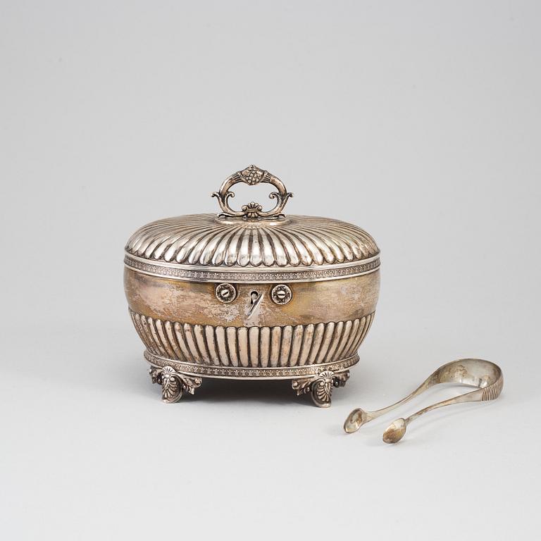 A silver sugar bowl and tongs, Gustaf Möllenborg, Stockholm 1831 and Michael Olof Barkman, Varberg 1824.
