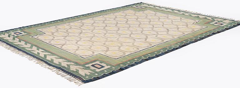 A carpet, flat weave, c. 340 x 246 cm, signed JBV (Johanna Brunssons Vävskola).