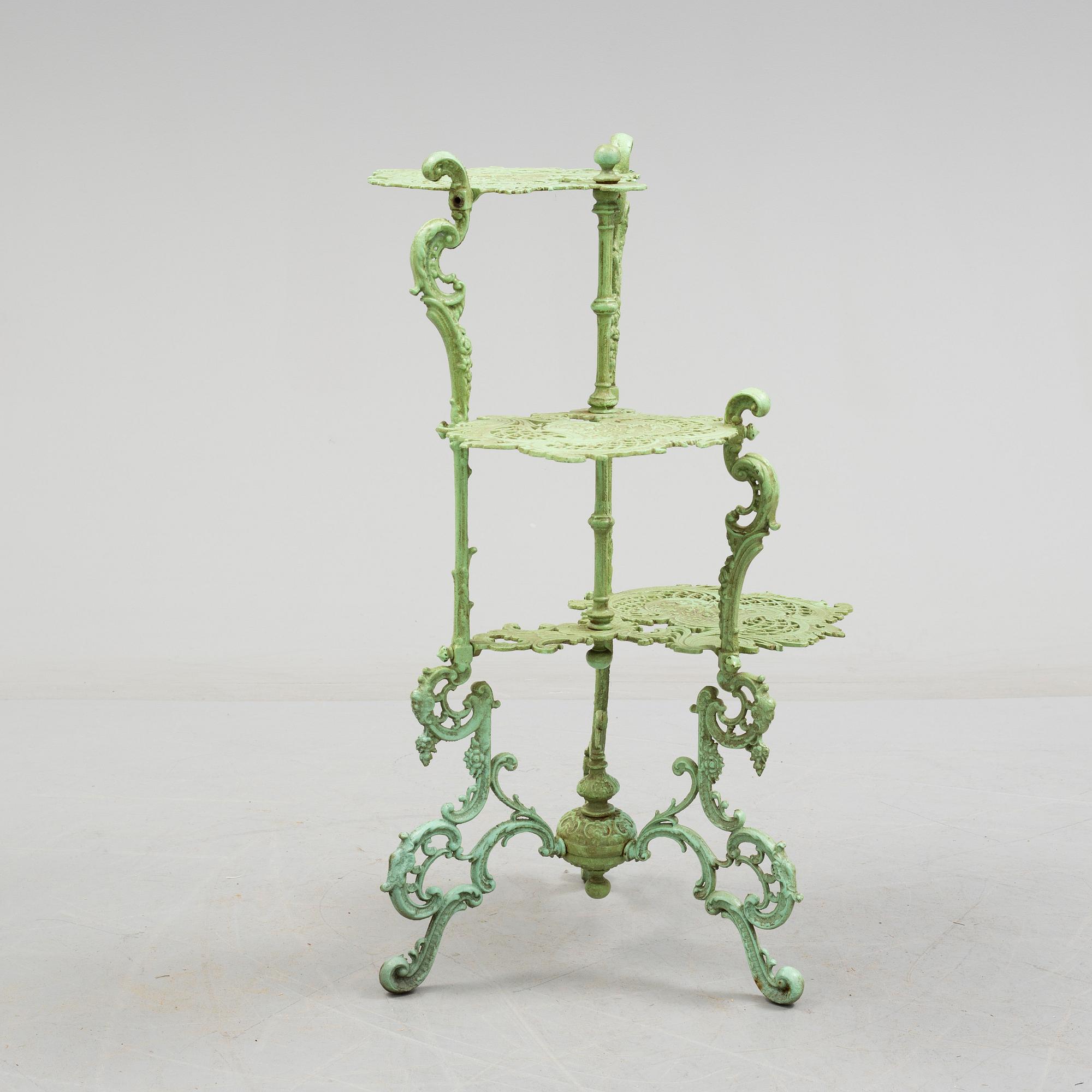 An early 20th century cast iron shelf.
