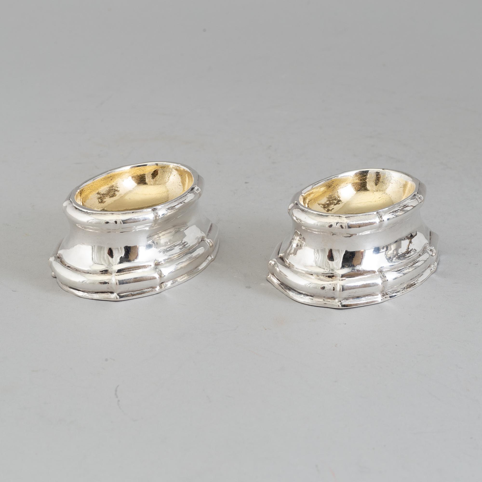 A pair of Rococo silver salt cellars, 18th Century.
