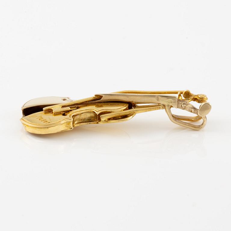 Arman (Armand Pierre Fernandez), a pendant in the form of a split violin, 18K gold, numbered 6/20.