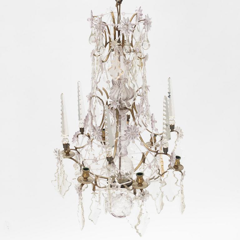 A six-light rococo-style chandelier, late 19th century incorporating older elements.