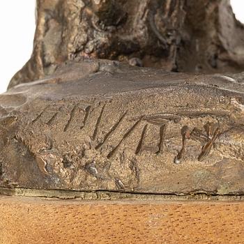 Axel Olsson, manlig gestalt med säck.