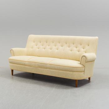 A second half of the 20th century sofa by Carl Malmsten.