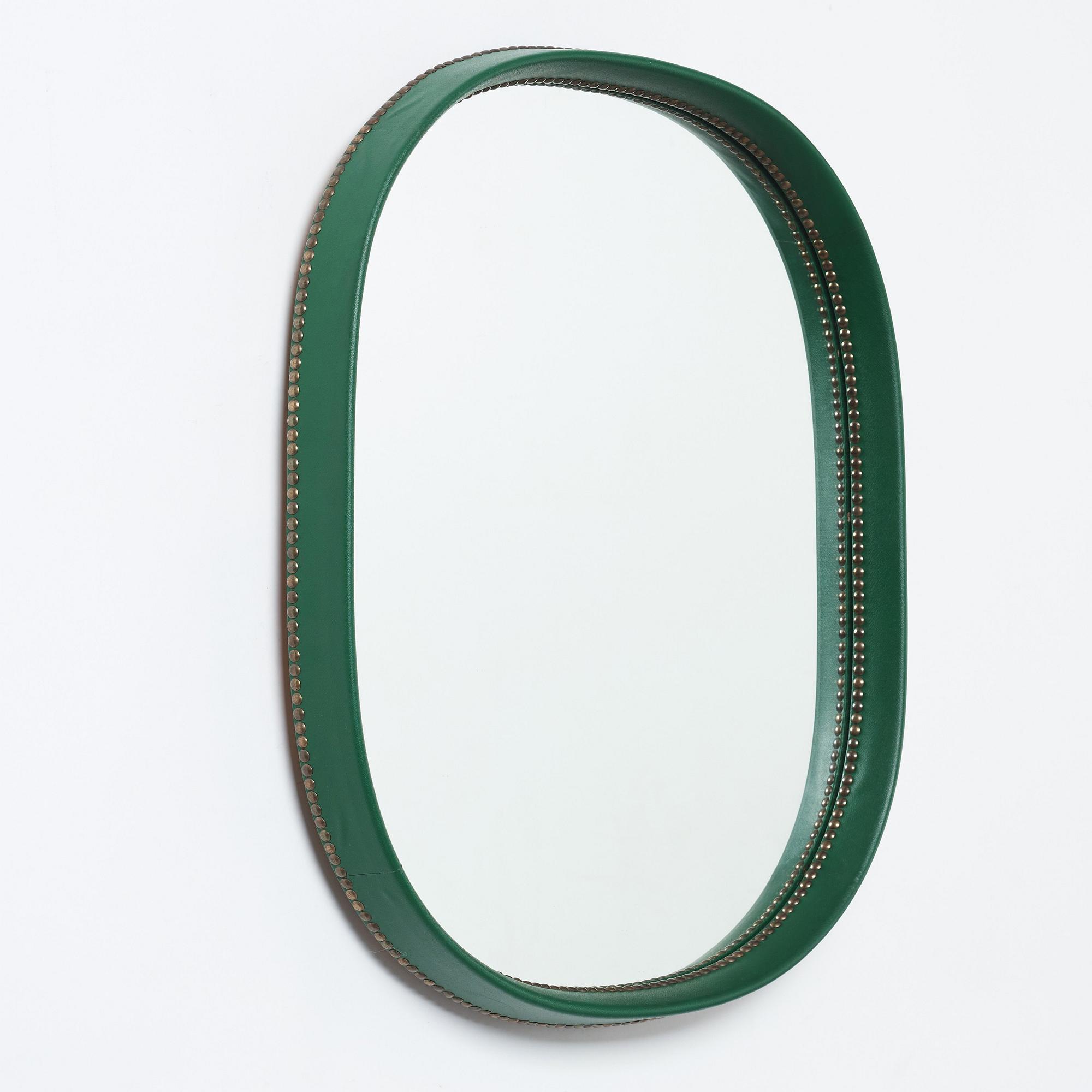 Otto Schulz, an artifical leather framed wall mirror, Boet, Gothenburg, Sweden 1940-50's.