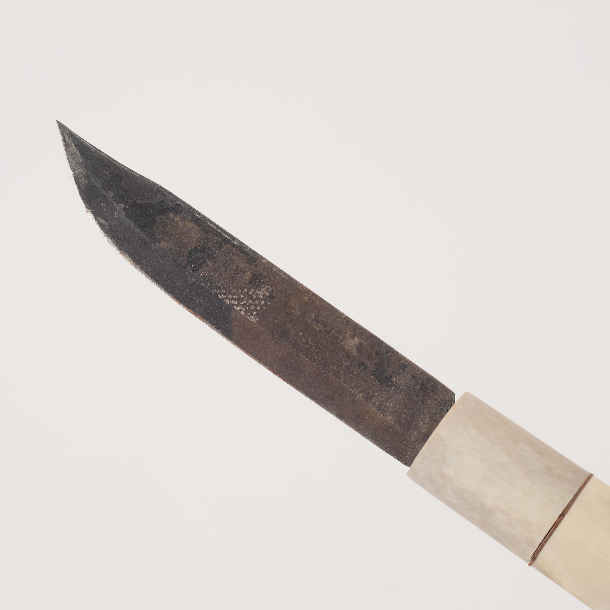 Thore Sunna, a reindeer horn knife, signed.