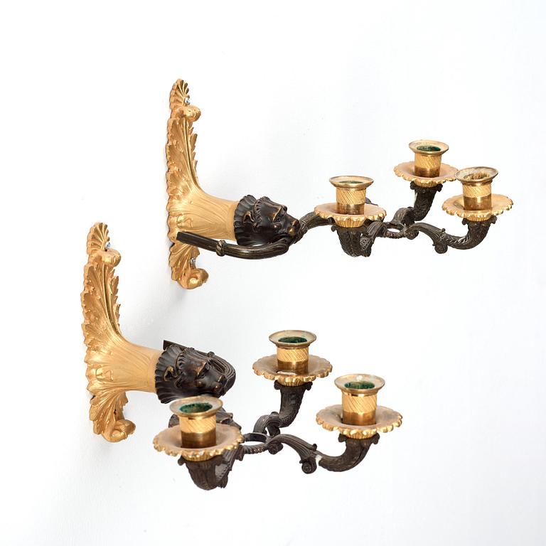 A pair of late Empire 1820's three-light wall-lights.