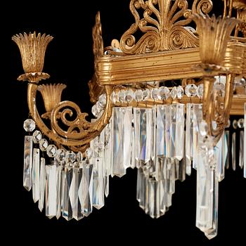 A German 19th century eight-light chandelier in the manner of Karl Friedrich Schinkel.