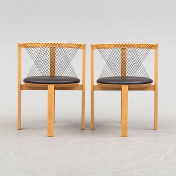 a pair of 'String Chairs' by Niels Jörgen Haugensen, Tranekaer Furniture, Denmark, late 20th century.