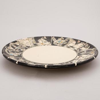 A ceramic bowl, signed and dated 1995.