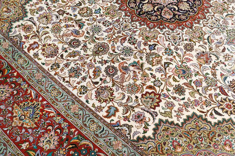 A part silk Tabriz carpet, sk 50 Radj, ca 312 x 296 cm.