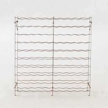 A 20th century metal wine rack.