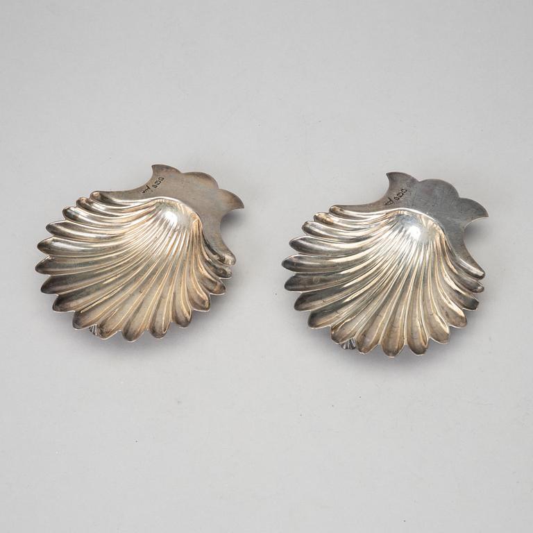 Two pairs of silver butter-shells, mark of Sheffield 1899, Birmingham 1905, & London 1914.