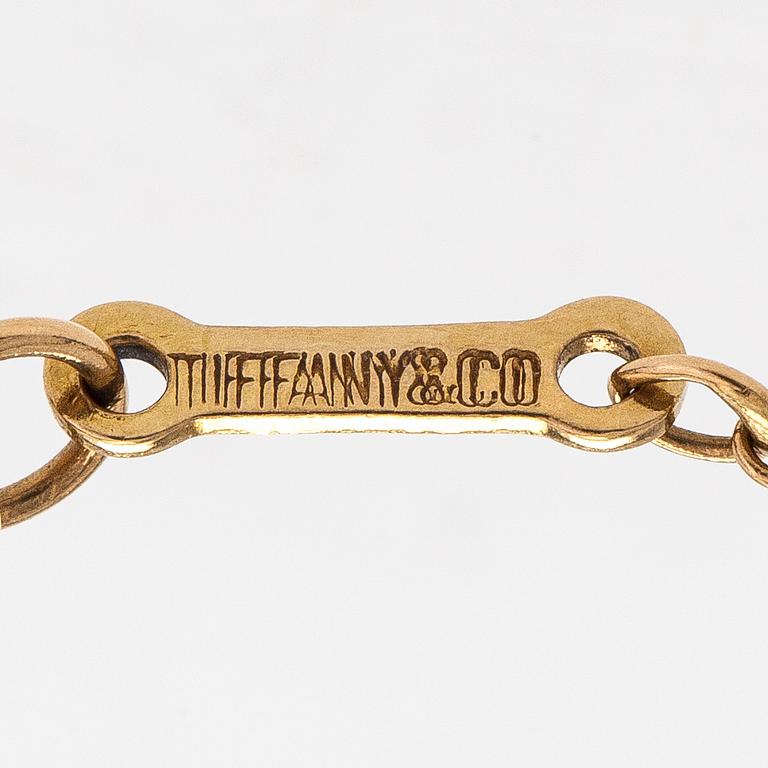 Tiffany & Co, Elsa Peretti, an 18K gold 'Bean' necklace.