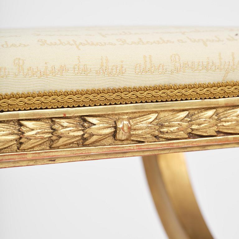A pair of late Gustavian giltwood stools, Stockholm, late 18th century.