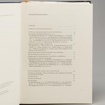 A set of 5 watch books.