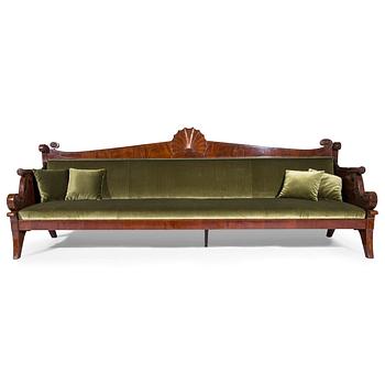 An Empire sofa, around 1820, the Reign of Alexander I (1801-25), Saint Petersburg, Russia. Length 333 cm.