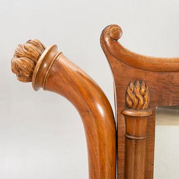 A late 19th century walnut floor mirror.