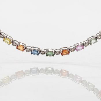 An 18K white gold necklace with multi-coloured sapphires and diamonds.