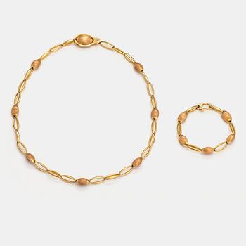 Chimento, "Accordi", an 18K gold necklace and bracelet with a diamond ca. 0.07 ct. Vicenzia, Italy.
