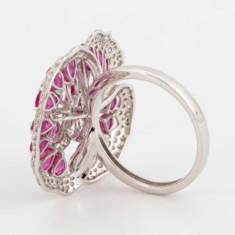 Ruby and brilliant-cut diamond flower ring.