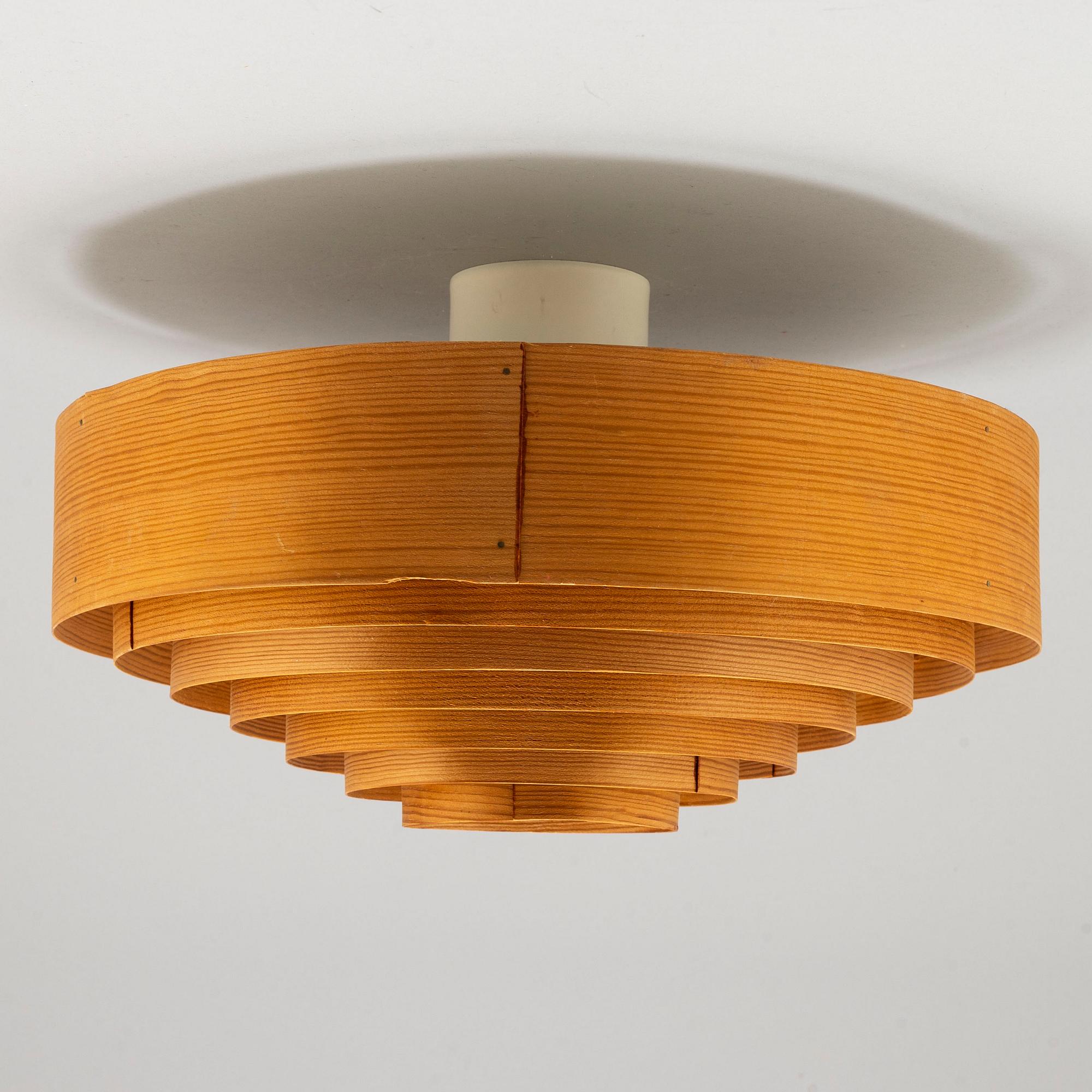 HANS-AGNE JAKOBSSON, a pinewood ceiling lamp, from AB Ellysett Markaryd, second half of the 20th century.