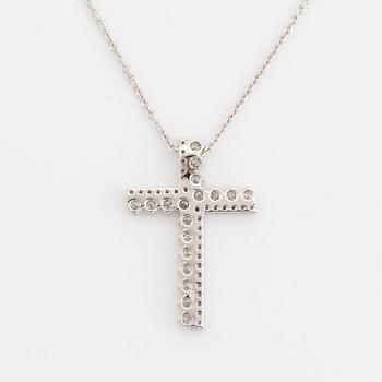 Brilliant cut diamond cross necklace.