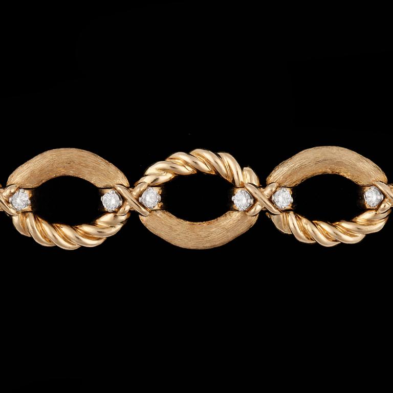 ARMBAND, Tiffany, guld med briljantslipade diamanter, tot. 1.20 ct.