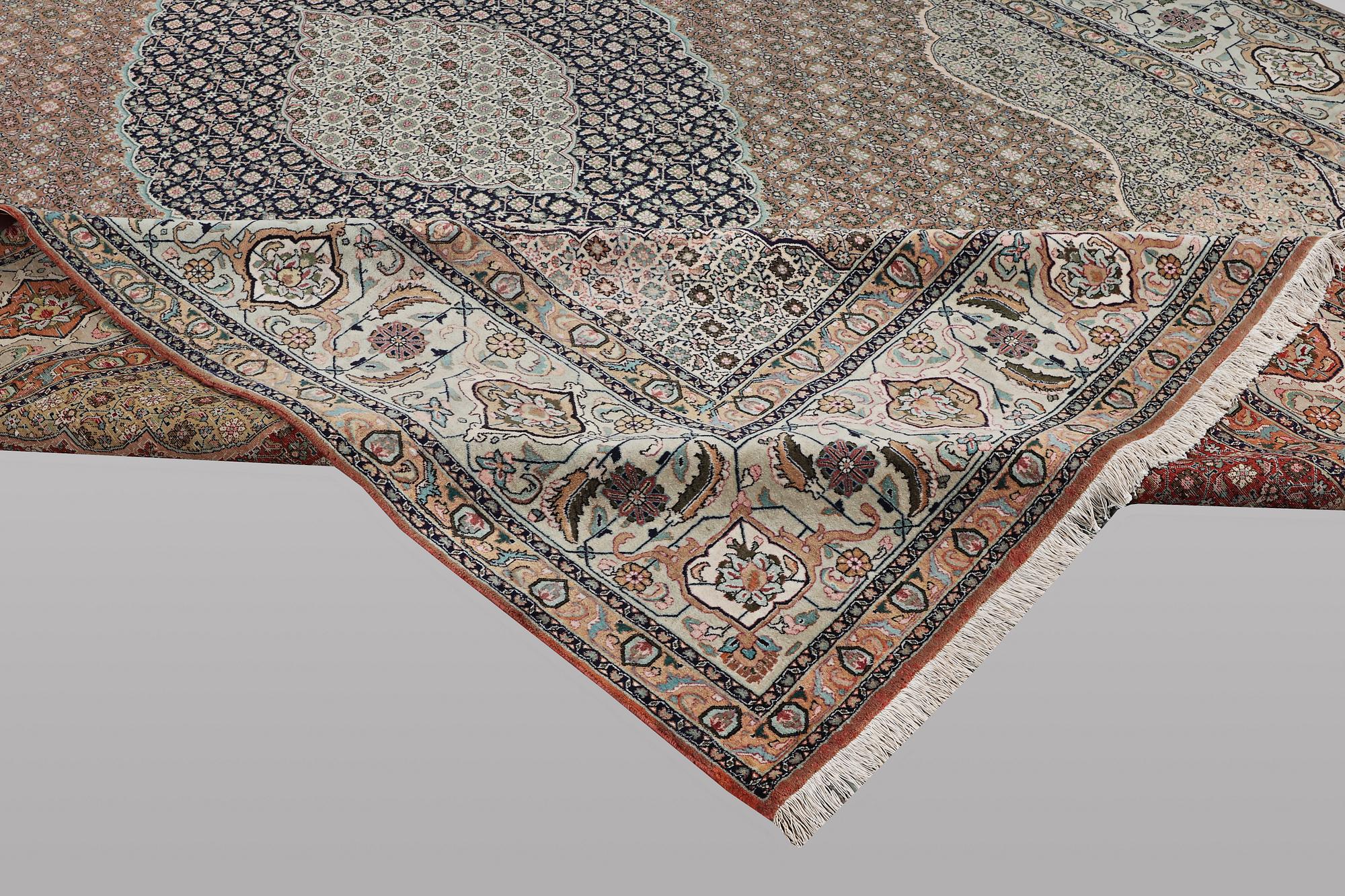 A carpet, Tabriz, part silk, 50 raj, ca 414 x 300 cm.