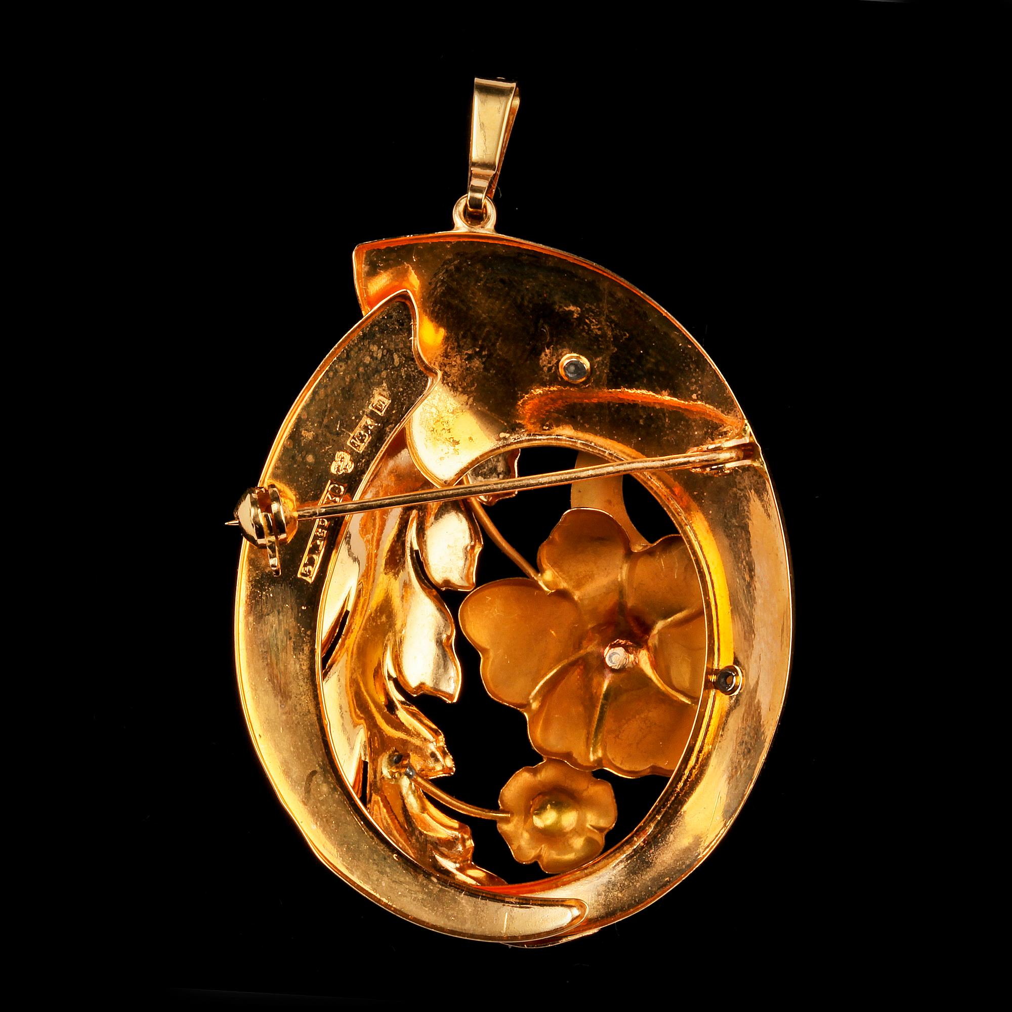 BROSCH/HÄNGE, 18k guld med 2 små orientaliska pärlor, Gustaf Dahlgren & co, Malmö, 1948. Vikt 10 g.