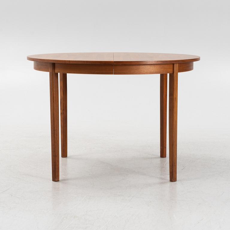 A teak dining table, second part of the 20th Century.