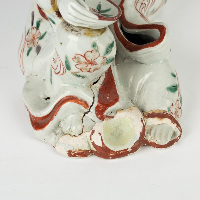 A Japanese porcelain figure, 18th century.