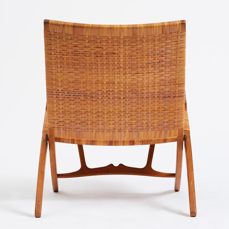 Hans J. Wegner, a foldable easy chair model 512, Johannes Hansen, Copenhagen, 1950s-60s.
