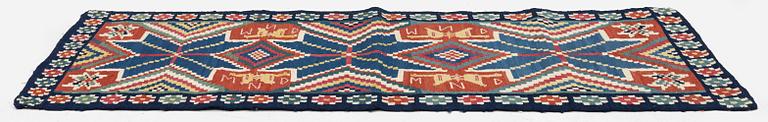 A flat weave carriage cushion, c. 116 x 48 cm, Färs district, Southwest Scania, Sweden, first part of the 19th century.