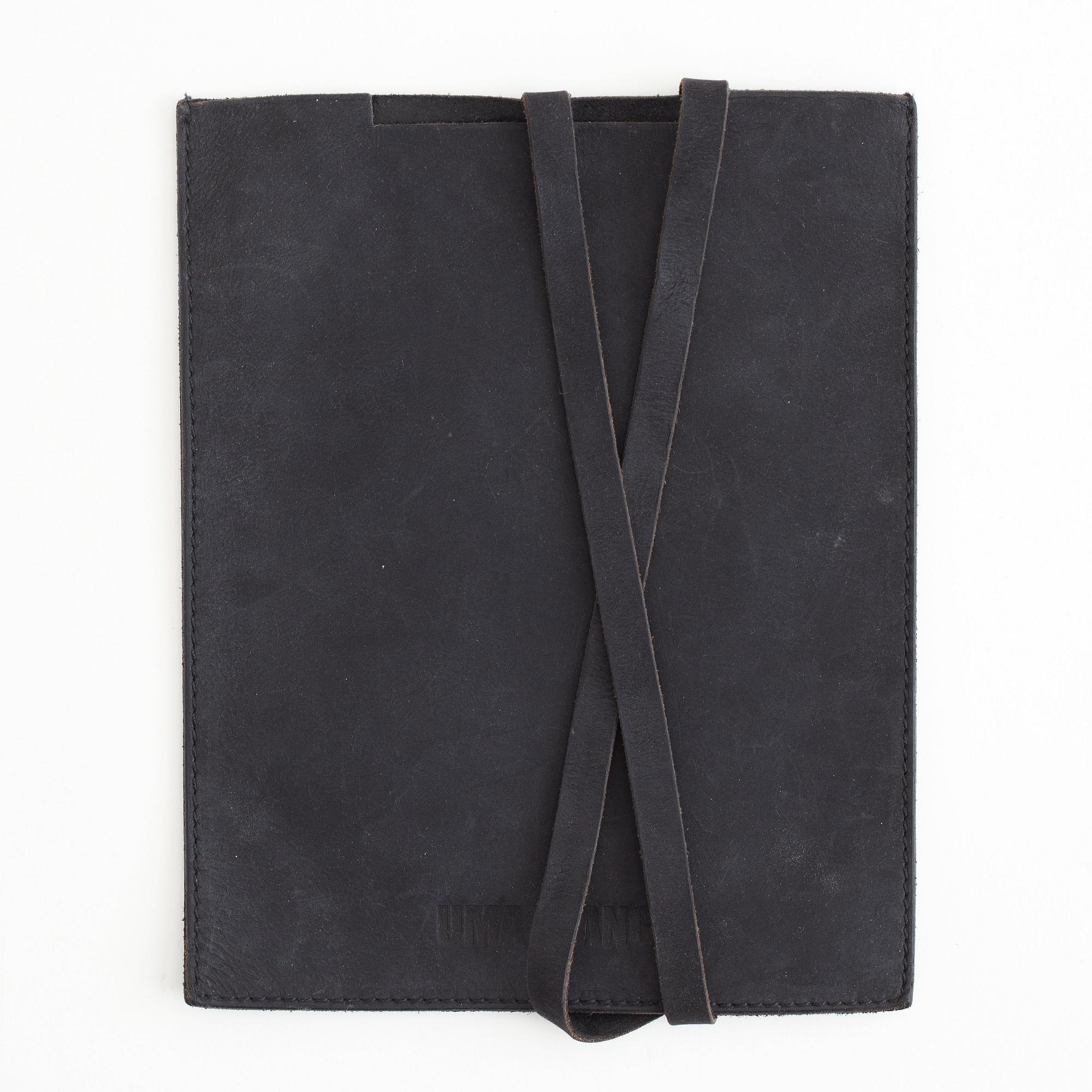 A pair of Uma Wang + Rigards, 'The Victorian', sunglasses and a Uma Wang, ipad case.