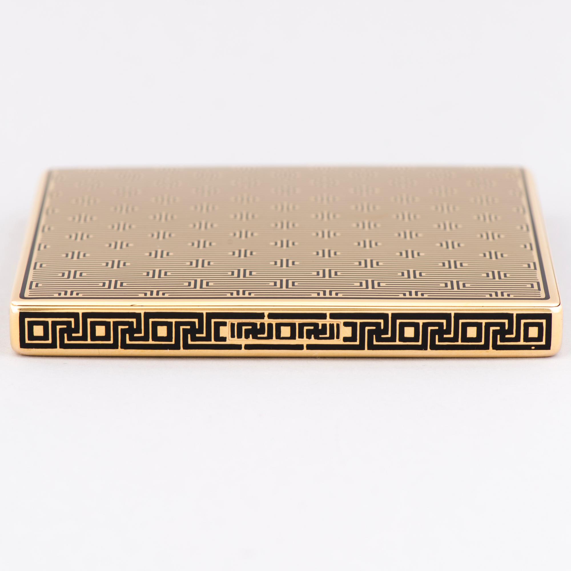 A GOLD CASE, 18K gold, black enamel. France.