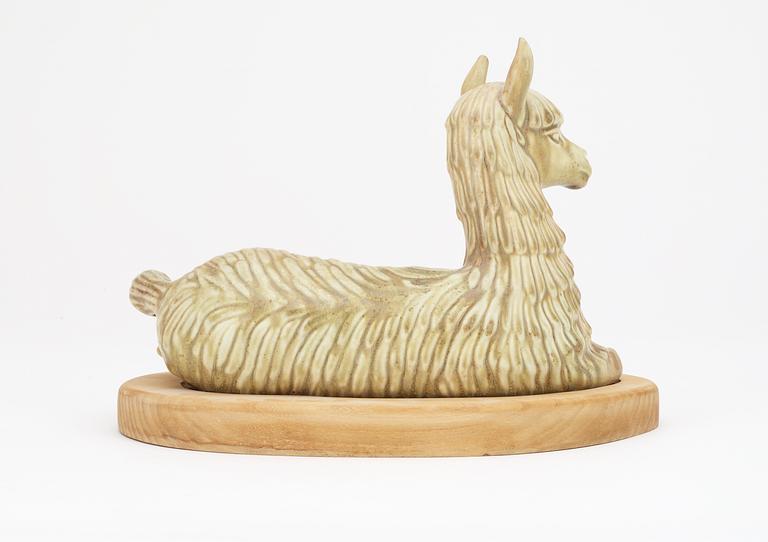 A Gunnar Nylund stoneware figure of a llama, Rörstrand.