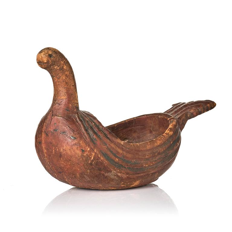 A Swedish carved and painted figural drinking vessel from Jämtland or Härjedalen, late 18th / early 19th century.