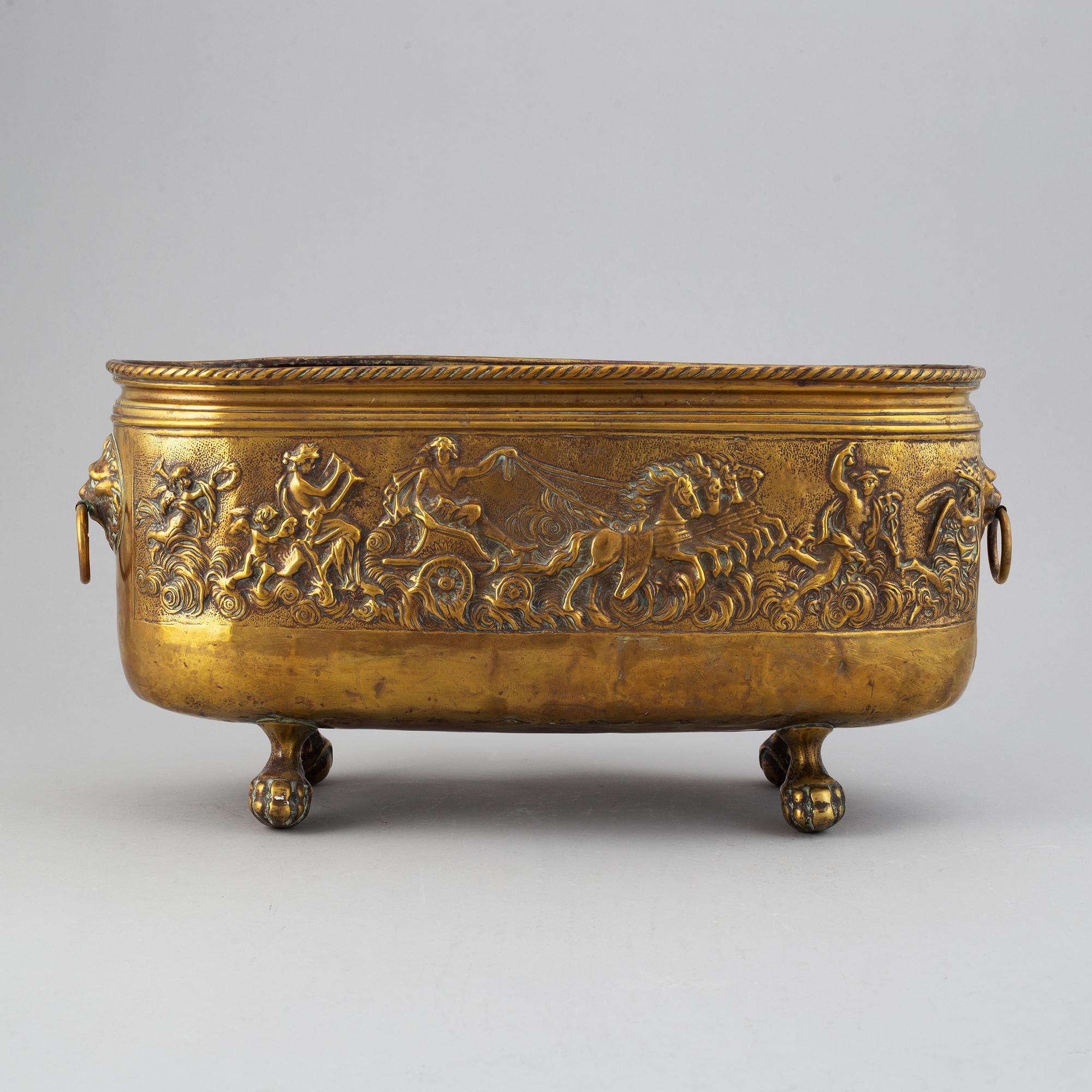 A 19th century brass jardiniere.