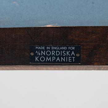 A set of six English mahogany chairs made for Nordiska Kompaniet Stockholm, mid 20th Century.