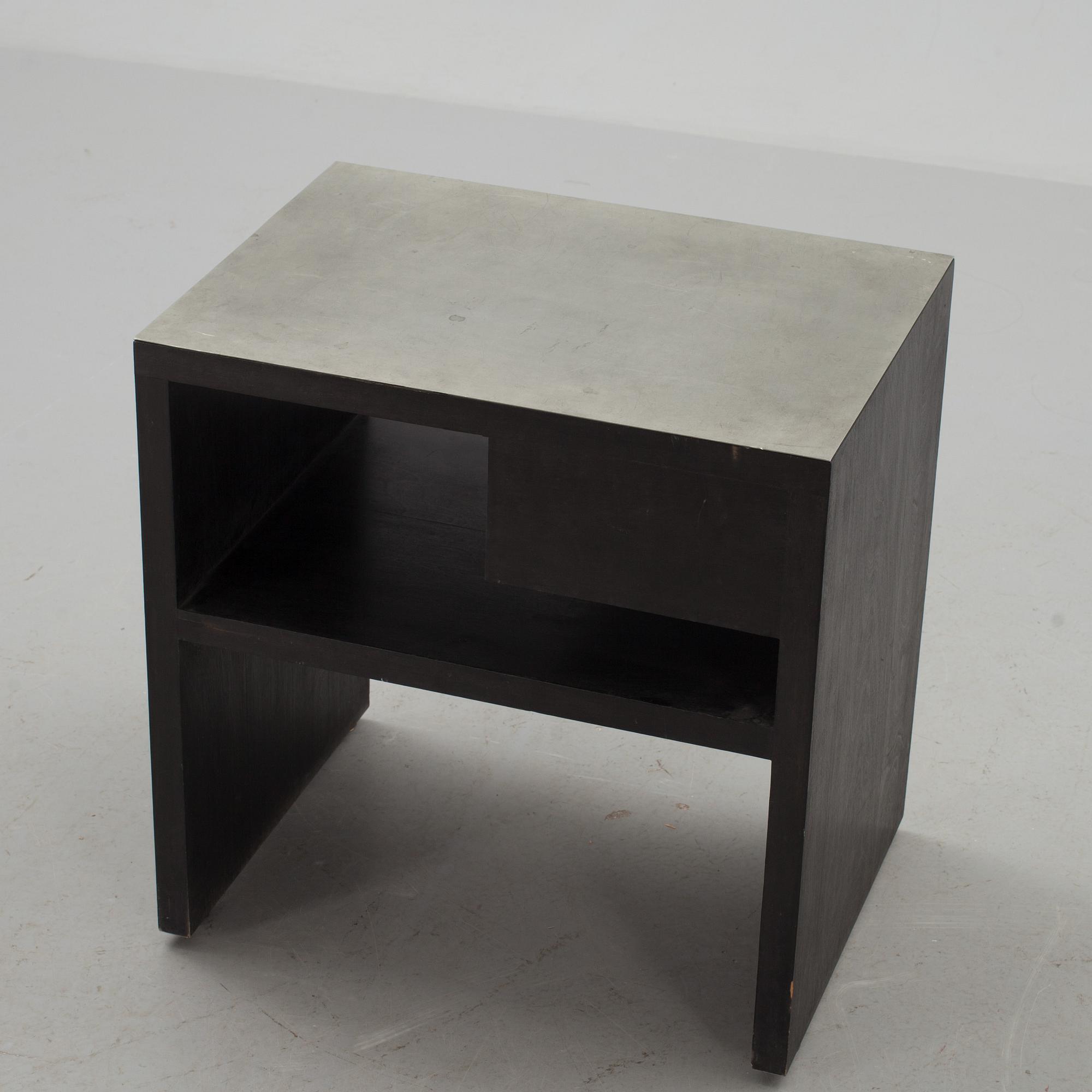 An Uno Åhrén black lacquered birch and pewter side table, Svenskt Tenn, Stockholm ca 1930.