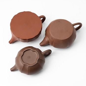 A group of three yixing teapots, China, 1980s.