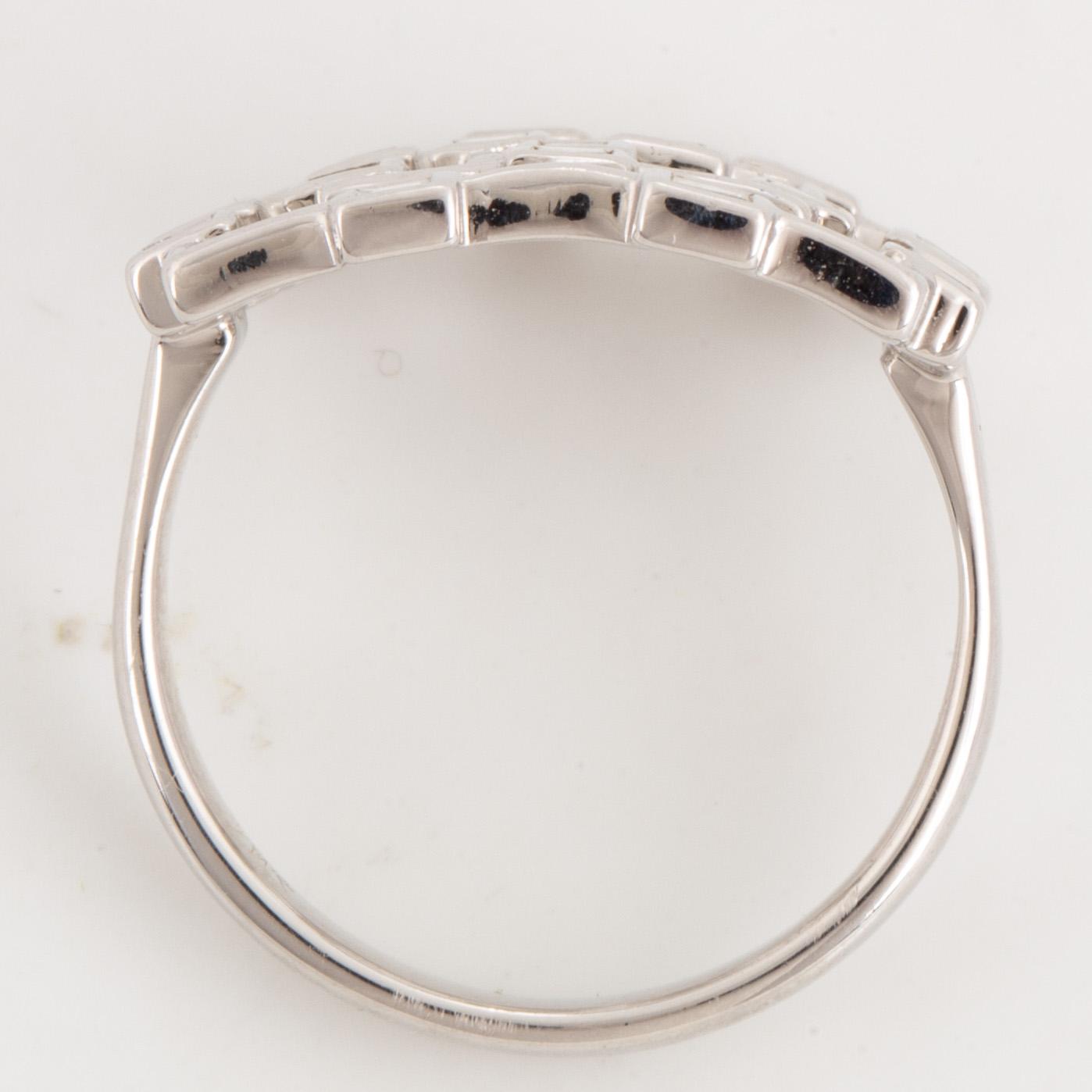 Step-cut diamond ring.