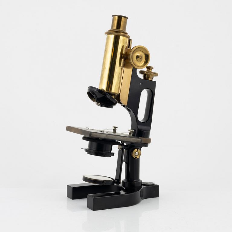 A microscope with accessories, Bausch & Lomb Optical Co. Rochester N.Y, early 20th Century.