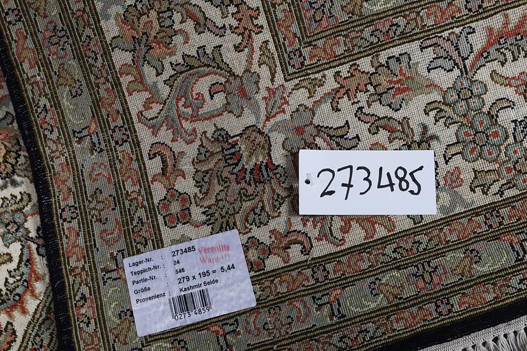 A carpet, silk Kashmir, ca 279 x 195 cm.