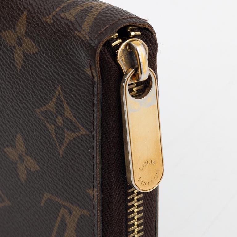 Louis Vuitton, A monogram canvas 'Zippy' wallet, 2009.
